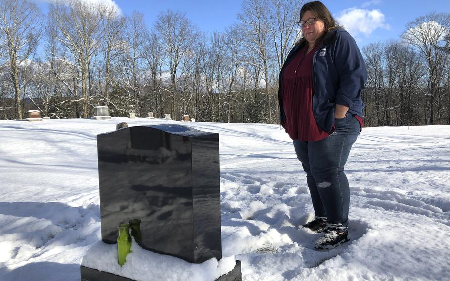 Deb Walker visits the grave of her daughter, Brooke Goodwin, Thursday, Dec. 9, 2021, in Chester, Vt. Goodwin, 23, died in March 2021 of a fatal overdose of the powerful opioid fentanyl and xylazine, an animal tranquilizer that is making its way into the illicit drug supply. According to provisional data released by the Centers for Disease Control and Prevention on Wednesday, May 11, 2022, more than 107,000 Americans died of drug overdoses in 2021, setting another tragic record in the nation’s escalating overdose epidemic.