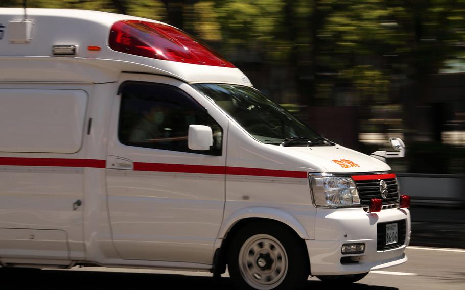 A Japanese ambulance drives through Yokohama in August 2020. 