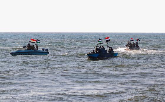 Members of the Yemeni Coast Guard affiliated with the Houthi group patrol the sea as demonstrators march through the Red Sea port city of Hodeida in solidarity with the people of Gaza on Jan. 4, 2024, amid the ongoing battles between Israel and the militant Hamas group in Gaza. (AFP via Getty Images/TNS)