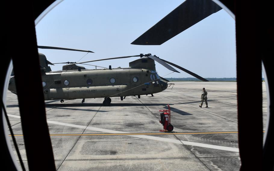 A view out the window of a Chinook helicopter