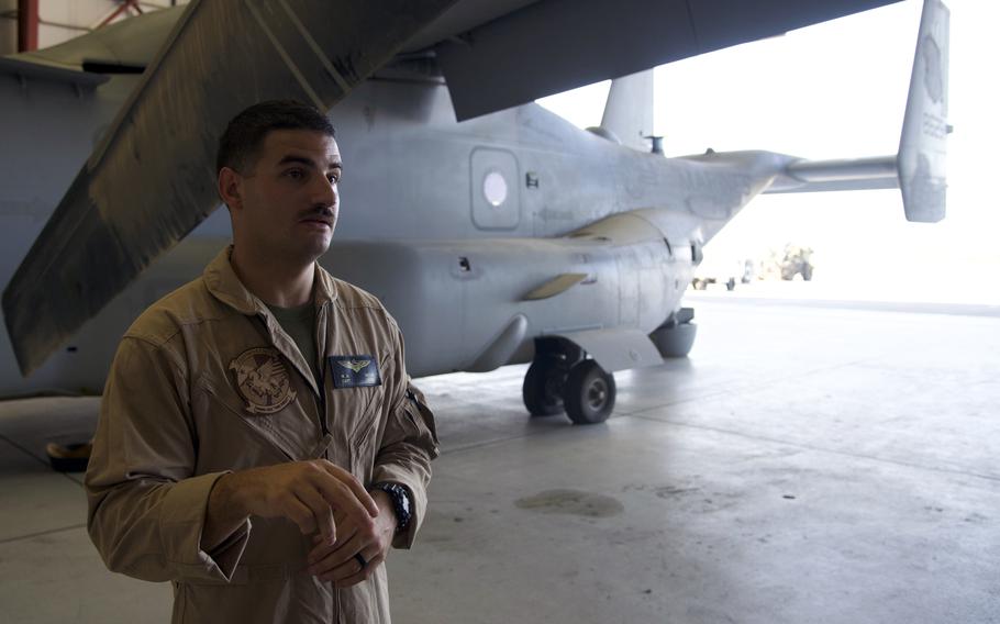Capt. Marc Meier, an MV-22 Osprey pilot deployed to Camp Lemonnier, Djibouti, on a deployment with Marine Medium Tiltrotor Squadron 161, discusses the squadron’s mission and alert status inside a hangar Oct. 27, 2021, at the U.S. military’s only permanent base in Africa.