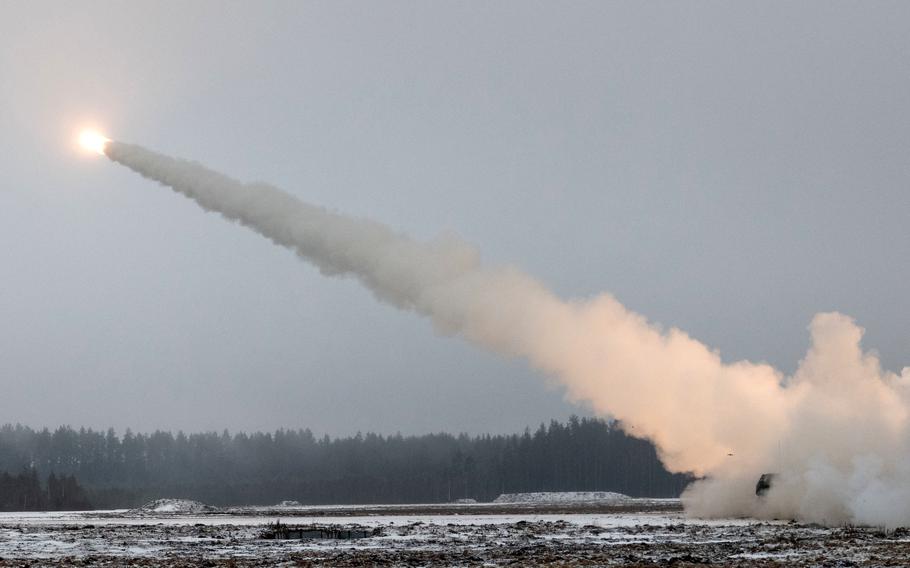 A High Mobility Artillery Rocket System belonging to the U.S. Army’s Task Force Voit is enveloped in smoke after launching a test rocket near Tapa, Estonia, on Jan. 27, 2025. 