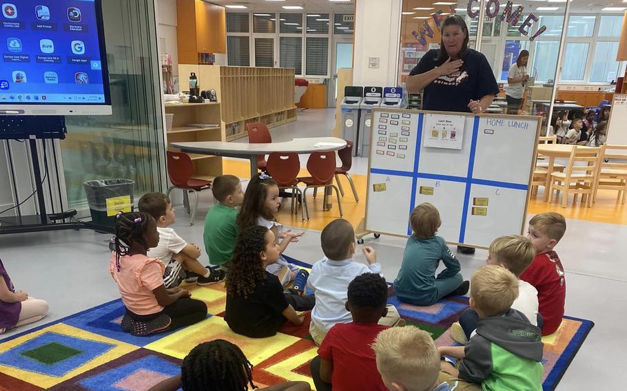 Kindergarteners listen to a lesson at Kaiserslautern Elementary School in Germany in August 2023. Registration for prekindergarten has begun this week at 80 Defense Department schools, marking the launch of the first full-day preschool program in most U.S. military communities worldwide.