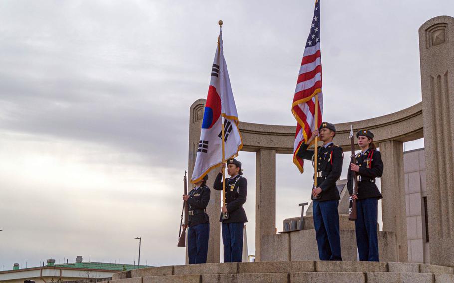 JROTC cadets take part in a Veterans Day ceremony at the Army memorial on Camp Humphreys, South Korea, Nov. 11, 2023.