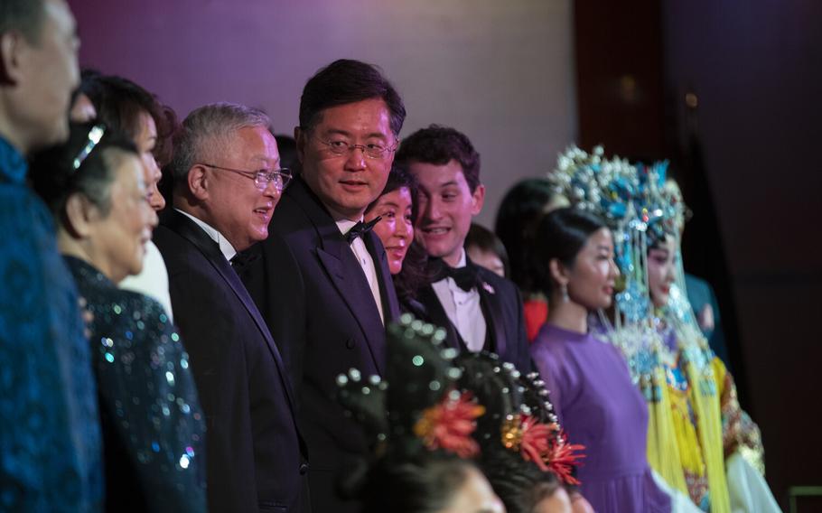 Chinese ambassador Qin Gang, center wearing glasses, takes photos with Chinese-American performers as he visits The Richard Nixon Library & Museum in Yorba Linda, Calif., on Feb, 24, 2022, to mark 50 years since Nixon visited China and began diplomatic relations. 