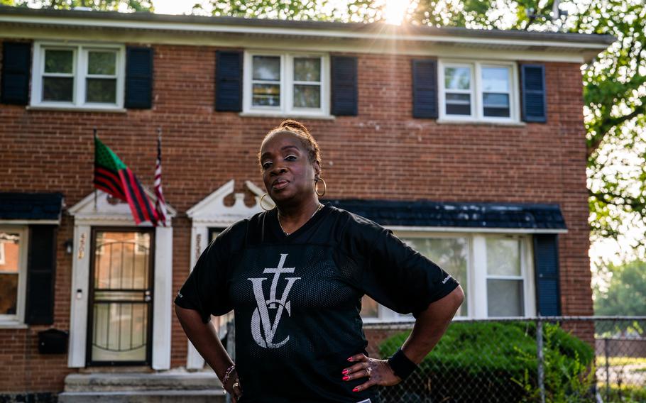 Bobbie Brown, 62, stands outside of her home in South Side Chicago on Wednesday, July 6, 2022. A man was killed and two others wounded while at a party on Brown’s block.