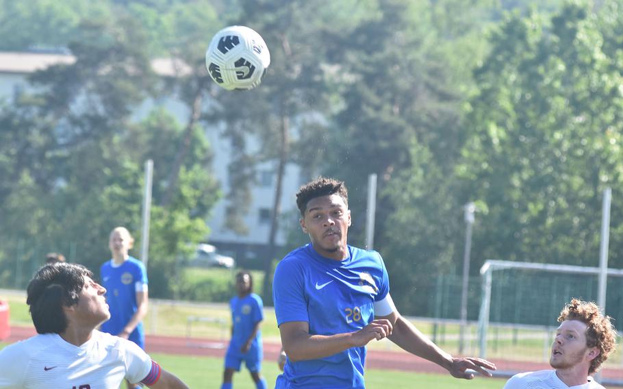 Ramstein’s Maxim Speed heads the ball against Lakenheath in the Royals’ 2-0 victory on the first day of the DODEA European Division I boys soccer championships Monday, May 20, 2024, at Kaiserslautern High School.