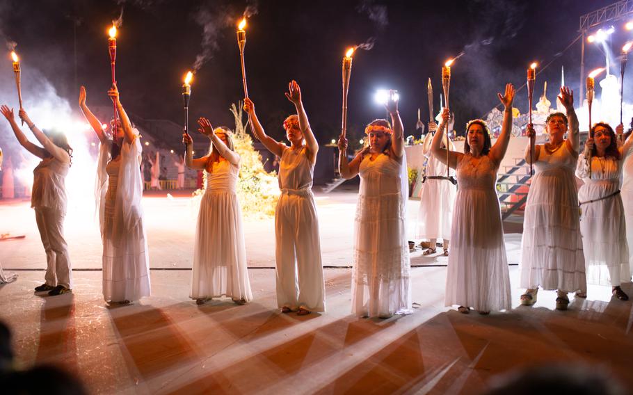 People celebrate St John’s Eve around a bonfire in Spain. The birth of John the Baptist is observed June 24, and the revelry usually involves parades and bonfires.