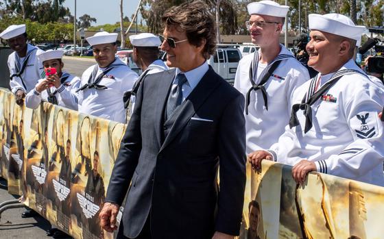 Tom Cruise poses with sailors at Naval Air Station North Island, Calif., in May 2022 for the advance premiere of "Top Gun: Maverick." According to media reports, Cruise was recently aboard the USS George H.W. Bush off the coast of Italy filming scenes for “Mission: Impossible – Dead Reckoning Part Two."