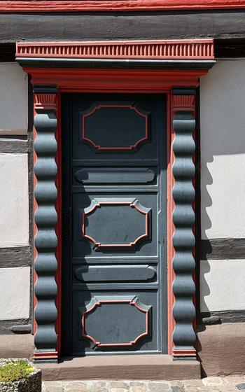 An old door on a half-timbered house.