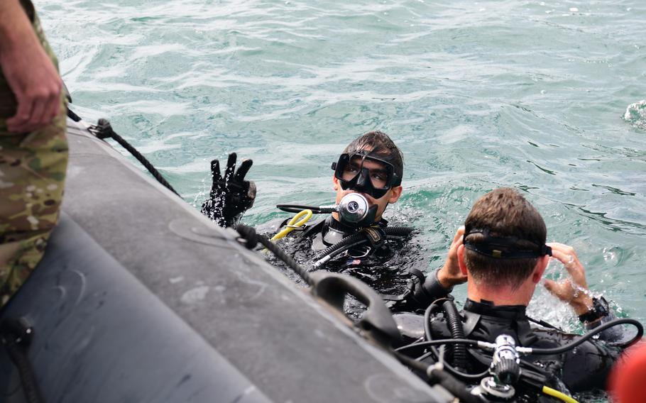 Sailors assigned to Explosive Ordnance Disposal Mobile Unit 8 conduct emergency action plan drills with the Bulgarian, Japanese and Ukrainian dive teams while underway off the coast of Varna, Bulgaria as part of Sea Breeze.
