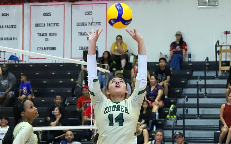 Teniya Nelson sets the ball.