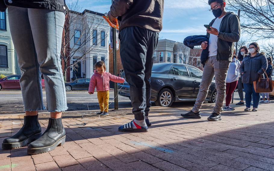 People wait in line Dec. 16, 2021, in Washington D.C. for coronavirus testing. 