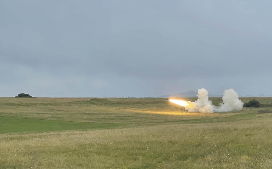 An M270 Multiple Launch Rocket System fires a rocket during an exercise the 41st Field Artillery Brigade conducted in conjunction with a family day at Grafenwoehr Training Area on Aug. 5, 2021.