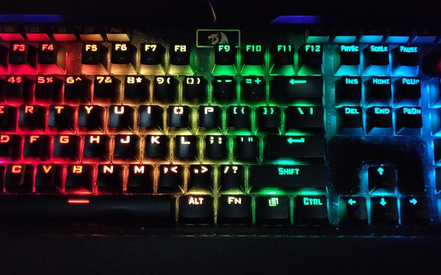 LED mechanical computer keyboard with rainbow lights.