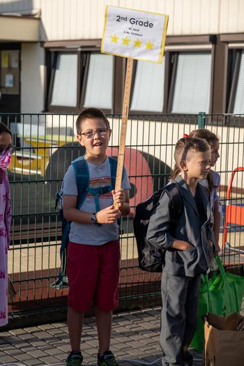 Children from Grafenwoehr Elementary School line up by grade for the first day of school, Aug. 22, 2022, in Grafenwoehr, Germany.