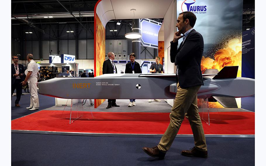 A visitor walks past a guide missile ground target KEPD 350 manufactured by the Swedish-German company Taurus at the International Defense and Security fair of Madrid, on May 17, 2023. 