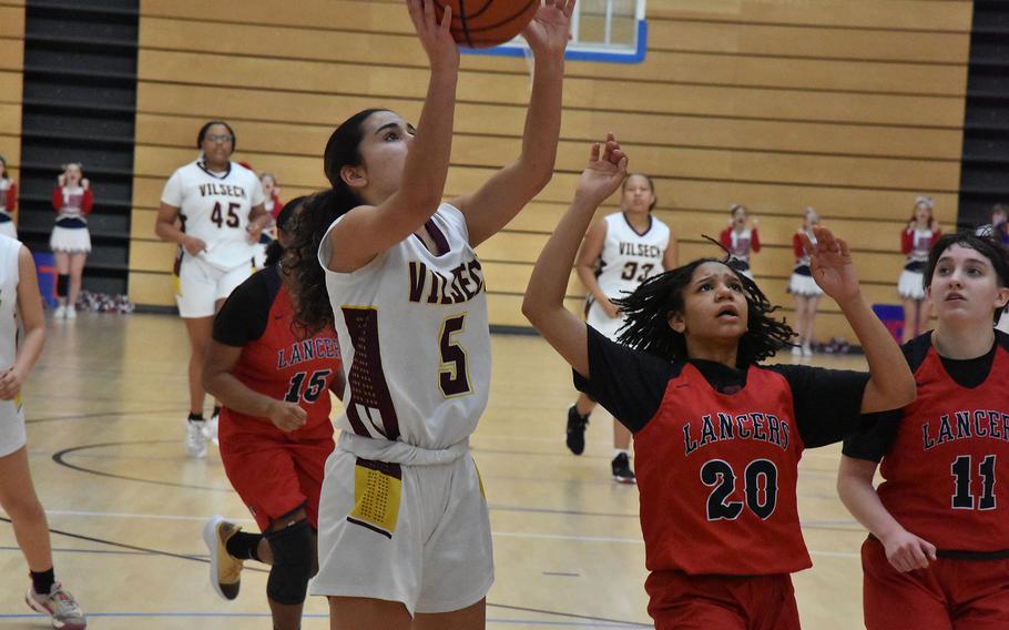 Vilseck’s Jayslin Santellano puts up a shot before a trio of Lakenheath defenders can arrive on the second day of pool play at the DODEA European Basketball Championships in Wiesbaden, Germany, on Thursday, Feb. 15, 2024.