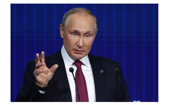Russian President Vladimir Putin Gestures While Speaking At The Plenary 