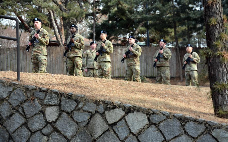 A firing team from 3rd Battlefield Coordination Detachment-Korea carries out a 21-gun salute in memory of those who fought in the Battle of Bayonet Hill, at Osan Air Base, South Kora, Feb. 2, 2023.