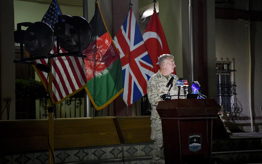 Marine Gen. Frank McKenzie, commander of U.S. Central Command and head of Afghan troops in Afghanistan, speaks to reporters at the former Resolute Support headquarters in Kabul, now called U.S. Embassy South, on July 25, 2021. The U.S. has accelerated an airstrike campaign against the Taliban, but it's unclear whether strikes will continue past Aug. 31, when U.S. forces are set to formally withdraw.