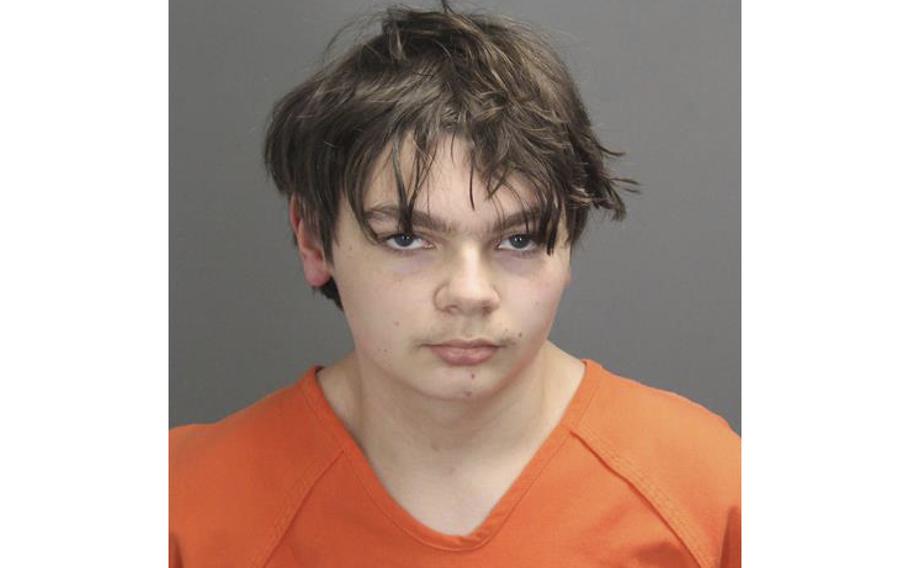 This booking photo released by the Oakland County, Mich., Sheriff’s Office shows Ethan Crumbley, 15, who is charged as an adult with murder and terrorism in a shooting that killed four fellow students and injured more at Oxford High School in Oxford, Mich., authorities said Wednesday, Dec. 1, 2021. 