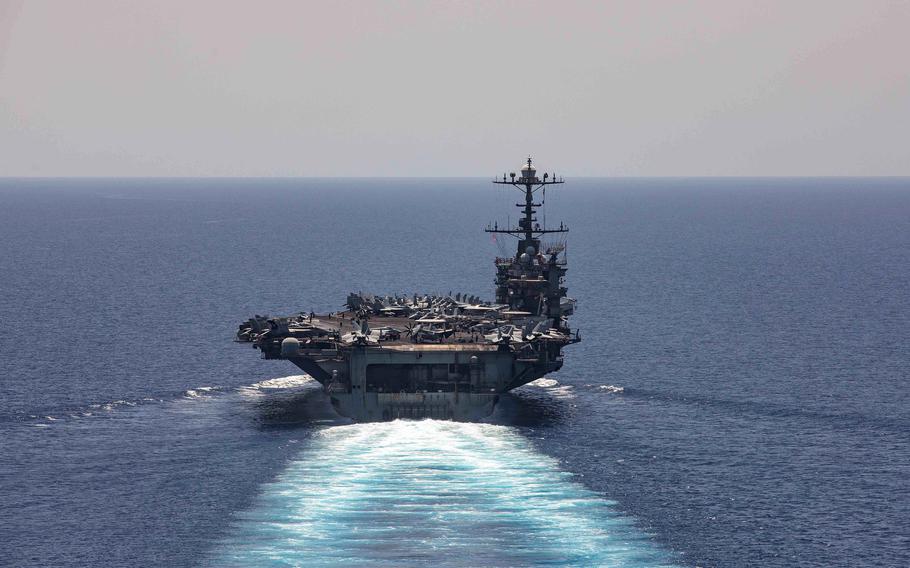 The aircraft carrier USS Harry S. Truman sails in the U.S. Central Command area of responsibility April 8, 2025. The Navy is investigating what caused a Super Hornet and a towing tractor to fall into the sea earlier this week.
