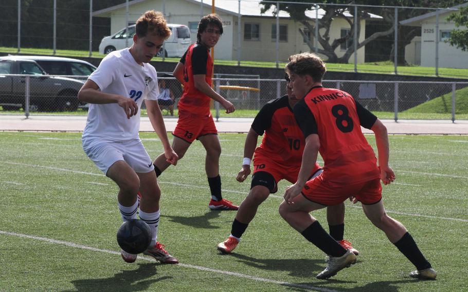 CAJ's William Arjmandpour plays keepaway against three Kinnick defenders.