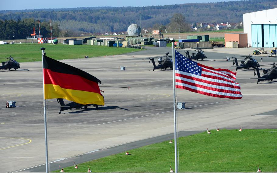 U.S. and German flags fly at Katterbach Army Airfield in Ansbach, Germany, April 21, 2016. City tax collectors here dropped their demand that a military family turn over American income records for inspection, marking a reversal in a case that sparked concerns that a contentious German tax collection effort was expanding.