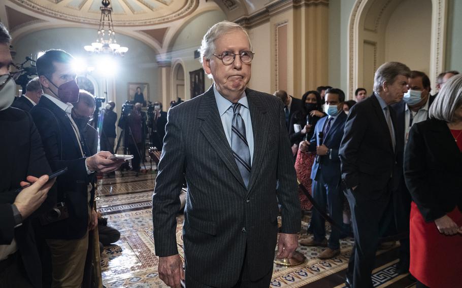 Senate Minority Leader Mitch McConnell, R-Ky., departs after a news conference following a weekly policy lunch on Capitol Hill in Washington, D.C. on Dec. 7.