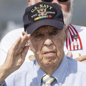 World War II Navy veteran Callan Saffell salutes during the 20th anniversary celebration of the National World War II Memorial in Washington, D.C., May 25, 2024.