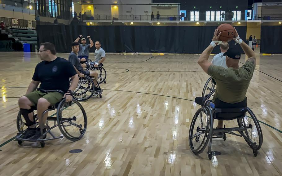 Members of Team SOCOM practice wheelchair basketball for the 2022 Department of Defense Warrior Games, Aug. 18, 2022. at the ESPN Wide World of Sports Complex in Orlando, Florida. 
