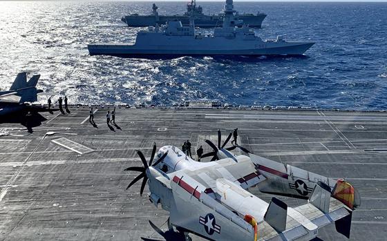 U.S. and allied ships sail in formation with the aircraft carrier USS Harry S. Truman in the Adriatic Sea on Wednesday, Feb. 2, 2022. 