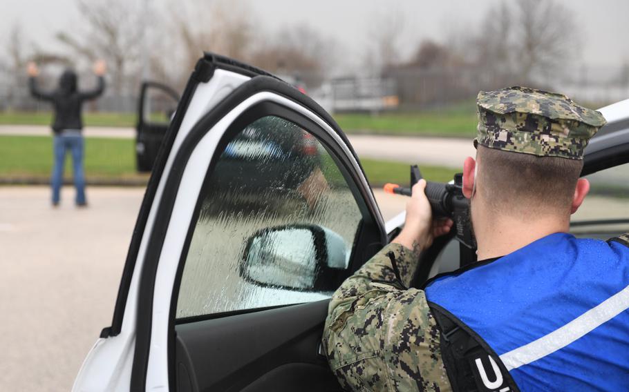 Petty Officer 2nd Class Sean Chastain apprehends a suspect during an exercise near Naples, Italy, on Jan. 25, 2021. Naval Support Activity Naples went into lockdown Dec. 16 after gunfire was reported on base, and security took a man and an airsoft rifle into custody.