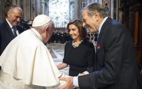 Pope Francis, greets Speaker of the House Nancy Pelosi, D-Calif., and her husband, Paul Pelosi before celebrating a Mass on the Solemnity of Saints Peter and Paul, in St. Peter's Basilica at the Vatican, Wednesday, June 29, 2022. Pelosi met with Pope Francis on Wednesday and received Communion during a papal Mass in St. Peter's Basilica, witnesses said, despite her position in support of abortion rights. (Vatican Media via AP)