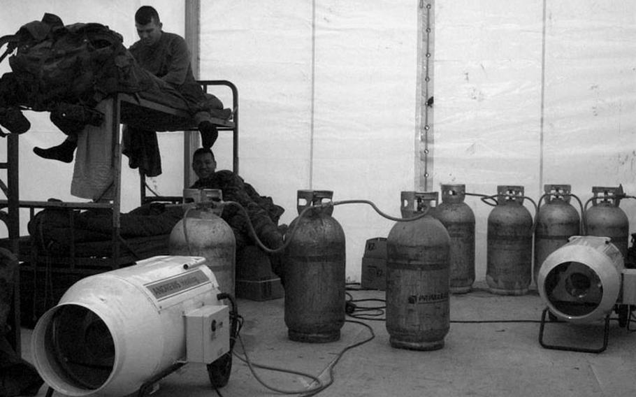 Taszar AB, Hungary, January, 1996: Gas heaters used to keep soldiers warm inside their tents put off noxious fumes, and must be monitored closely.