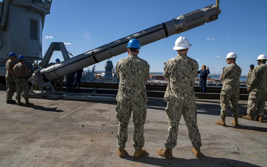 Japan is considering new defensive measures that may include purchasing Tomahawk missiles, seen here being offloaded from the USS Frank Cable on April 24, 2022. 