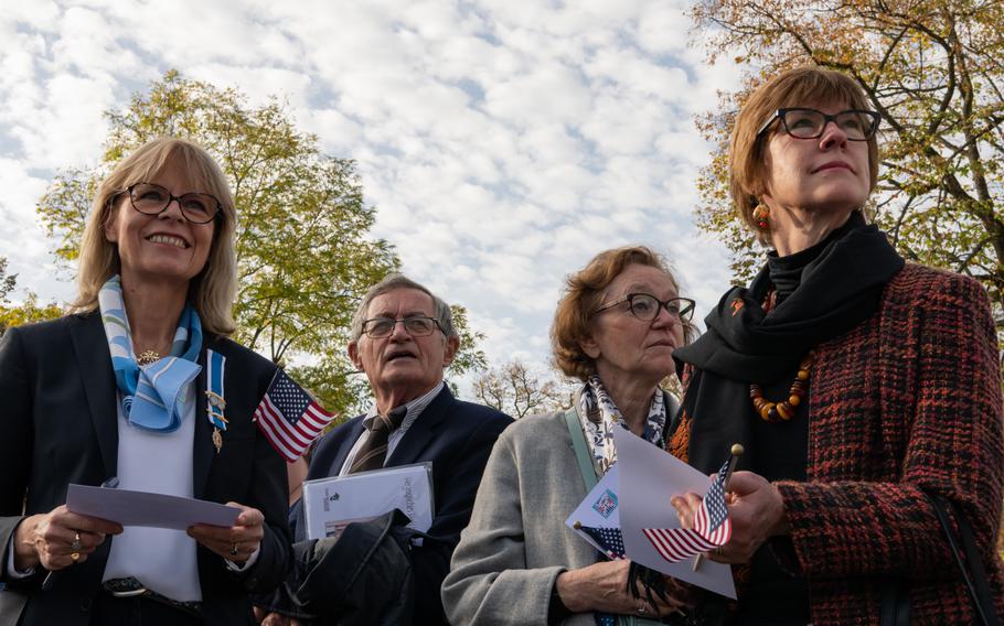 Catherine Armand, a member of the Daughters of the American Revolution Rochambeau Chapter in France, left, Jacques Hauvette and other DAR Rochambeau Chapter members Anne Hauvette and Janet Galas Hill attend a plaque unveiling in Zweibrucken, Germany, Saturday, Oct. 29, 2022, commemorating the Regiment Royal Deux-Ponts.