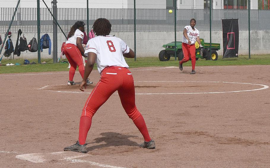 Raider third baseman Ariyanna Garrett throws to first baseman Aries Garrett during the first game against Vilseck on Saturday at Kaiserslautern High School in Kaiserslautern, Germany. The Raiders improved to 13-0 overall and 10-0 in the league after sweeping the Falcons.