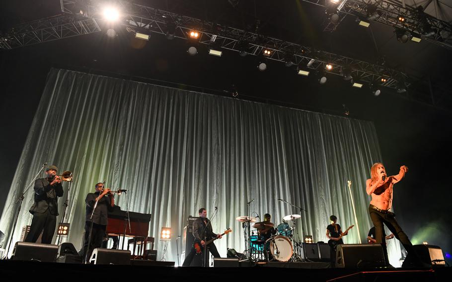 Iggy Pop performs on stage.
