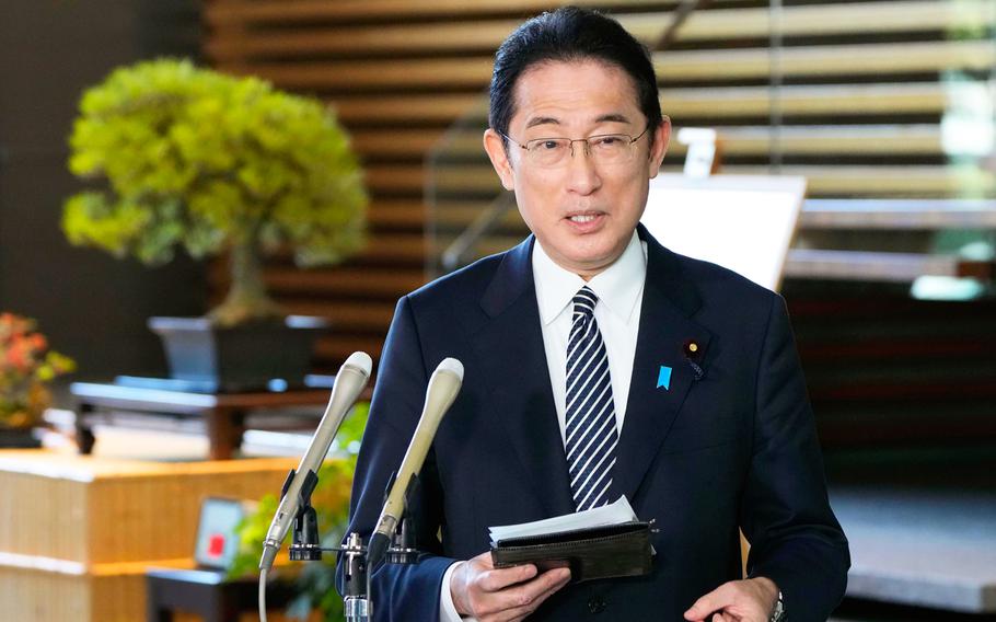 Japan’s Prime Minister Fumio Kishida answers to reporters' questions at his official residence in Tokyo Friday, March 11, 2022.