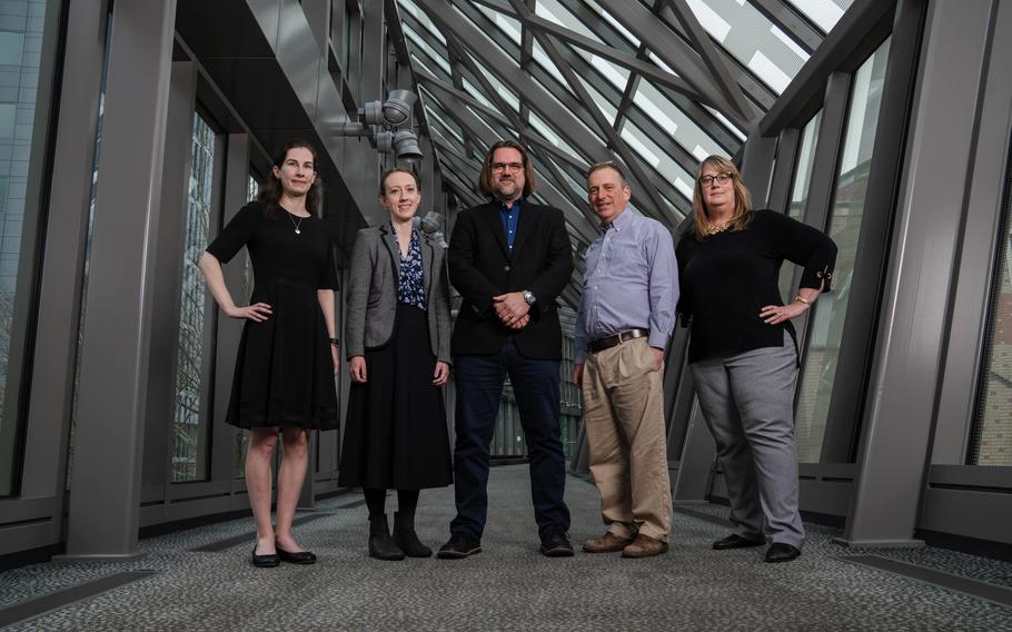 Key members of the new Center for Forecasting and Outbreak Analytics include, from left, Rebecca Kahn, senior scientist; Caitlin Rivers, associate director; Dylan George, operations director; Marc Lipsitch, director for science; and Alison Kelly, deputy director.
