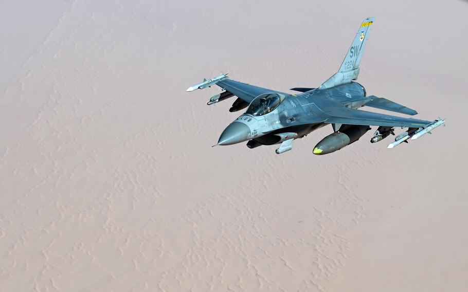 A U.S. Air Force F-16 Fighting Falcon pulls away after refueling with a KC-135 Stratotanker assigned to the 91st Expeditionary Air Refueling Squadron over the U.S. Central Command area of responsibility, Feb. 3, 2023. 