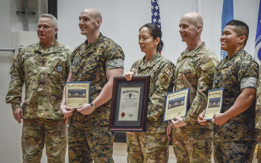 U.S. Forces Korea commander Army Gen. Paul LaCamera, far left, poses with Good Neighbor Award winners at Camp Humphreys, South Korea, April 4, 2024.