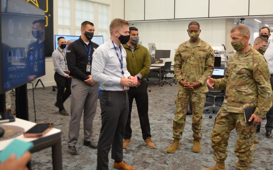 Capt. Dan Lyell, product manager at the Army Software Factory in Austin, Texas, discusses the This is My Squad app with Sgt. Maj. of the Army Michael Grinston on Oct. 28, 2021. The app is named for Grinston’s signature program and aims to improve time management for troops. 