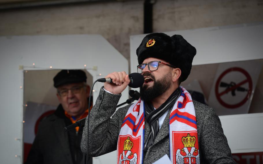 Jovica Jovic, who runs the pro-Russian YouTube channel TV Russia, addresses the crowd during an anti-war protest in downtown Ramstein-Miesebach, Germany, on Feb. 26, 2023.