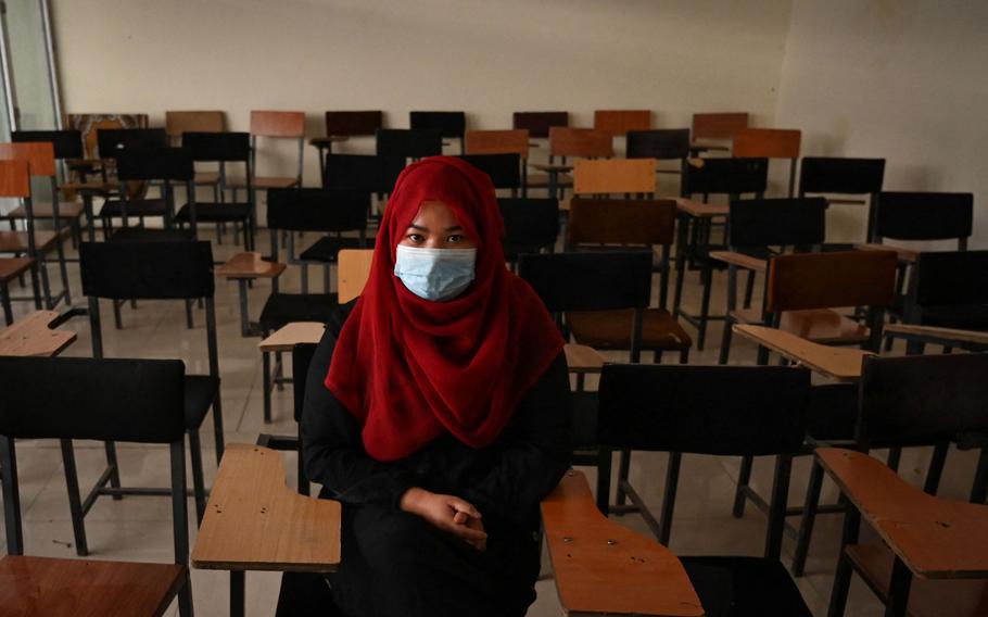 A student sits inside a classroom after private universities reopened in Kabul, Afghanistan, on Sept. 6, 2021. The Taliban said this week that female students won’t be able to return to Kabul University until “a real Islamic environment” is provided for all. 