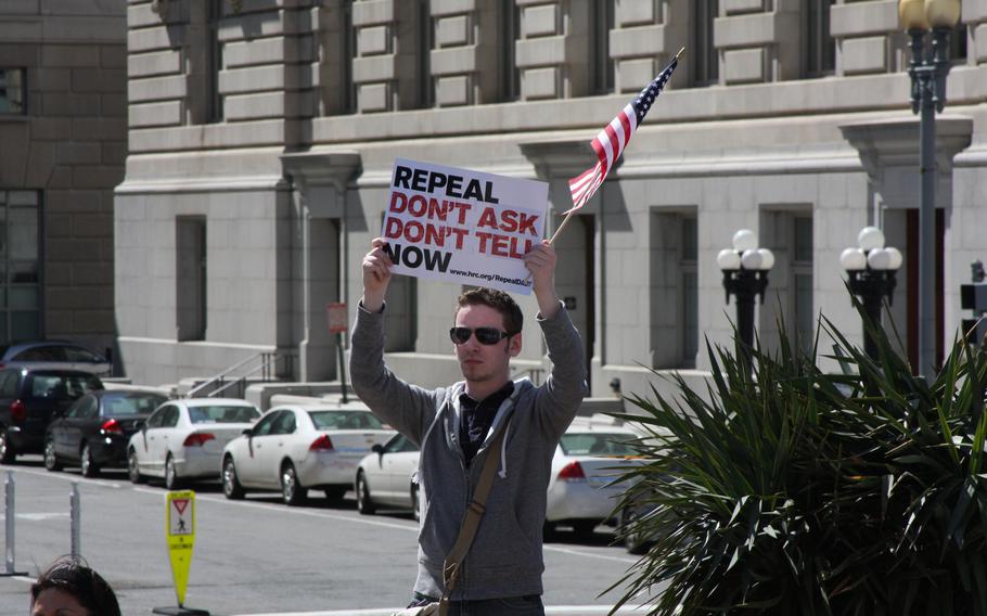 A protestor cheers on calls for a repeal of the military’s “don’t ask, don’t tell” law during a rally in Washington, D.C. Mar. 18, 2010.