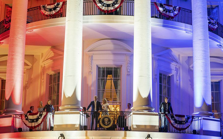 President Biden and first lady Jill Biden watch fireworks during an Independence Day celebration on the South Lawn of the White House last year. 