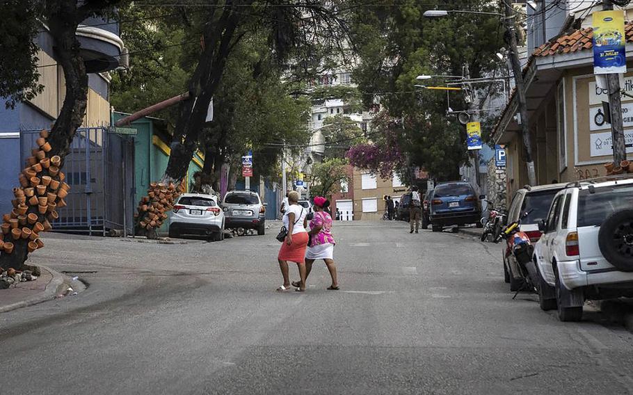 Normally, this street in Petionville, Haiti, would be clogged with traffic, but on this particular day, June 20, 2022, traffic is light, especially as the sun goes down, due to rampant kidnappings and mounting gang violence. 
